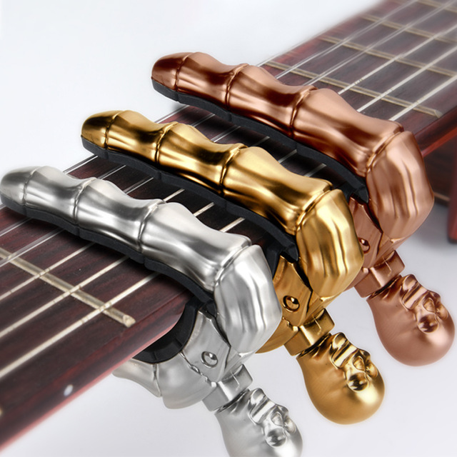 Capo đàn guitar đầu lâu màu ngẫu nhiên