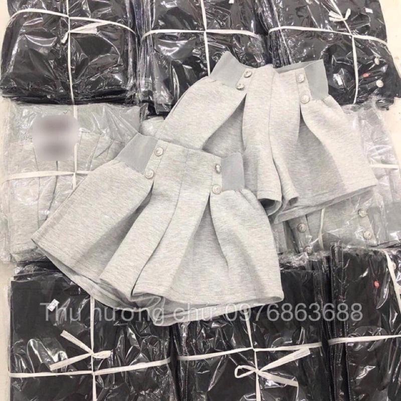 Quần xốp phồng quảng châu,quần chất xốp phồng.quần short nữ 4 khuy 2 màu đen trăng
