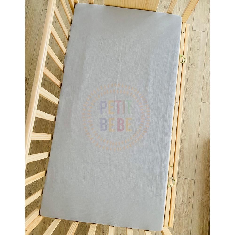 Ga bọc đệm cũi đa năng bo chun cho bé PETIT BEBE muslin 62x114cm màu trơn