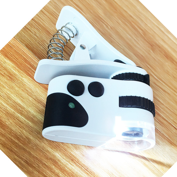 Kính lúp mini 50X kẹp điện thoại tích hợp LED trắng và LED tím ( TẶNG QUẠT MINI CẮM CỔNG USB SIÊU SÁNG NGẪU NHIÊN )