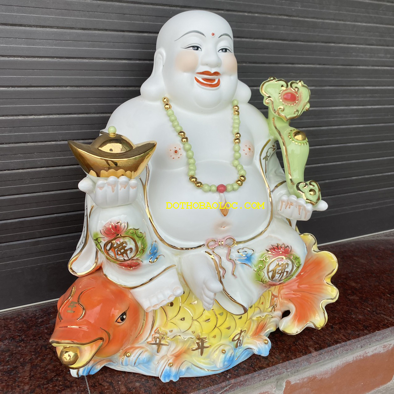 Tượng Di Lặc men sứ ngồi trên cá chép hóa rồng cao 50cm