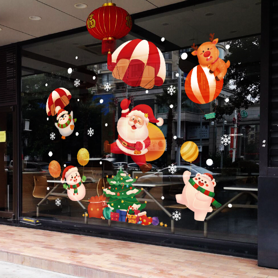 Decal dán tường - ông già nodel đu dù phát quà cùng các bạn