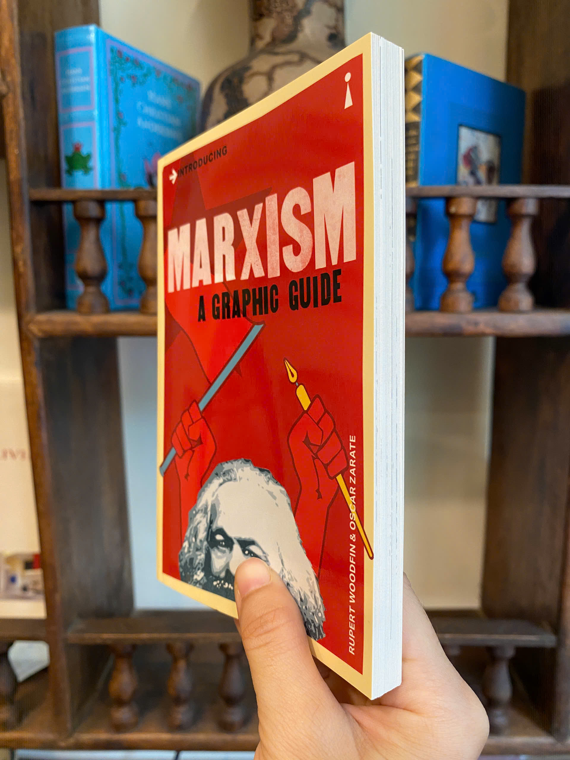 Sách - Introducing Marxism: A Graphic Guide by Rupert Woodfin | Philosophy / Biography Nonfiction
