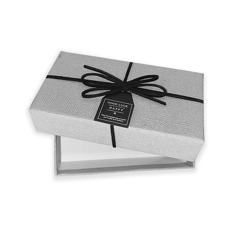 Hộp bìa cứng giấy art gắn dây nơ &amp; nhãn thankyou rất sang kích thước 13x7x5cm Q605