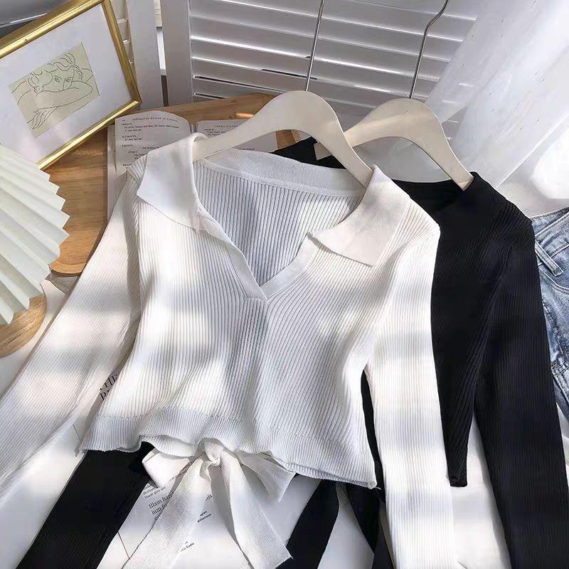 Áo croptop tay dài hở lưng buộc nơ trắng đen