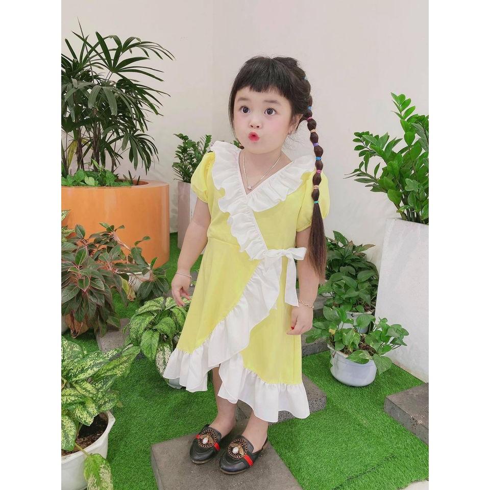Đầm vàng chéo NƠ