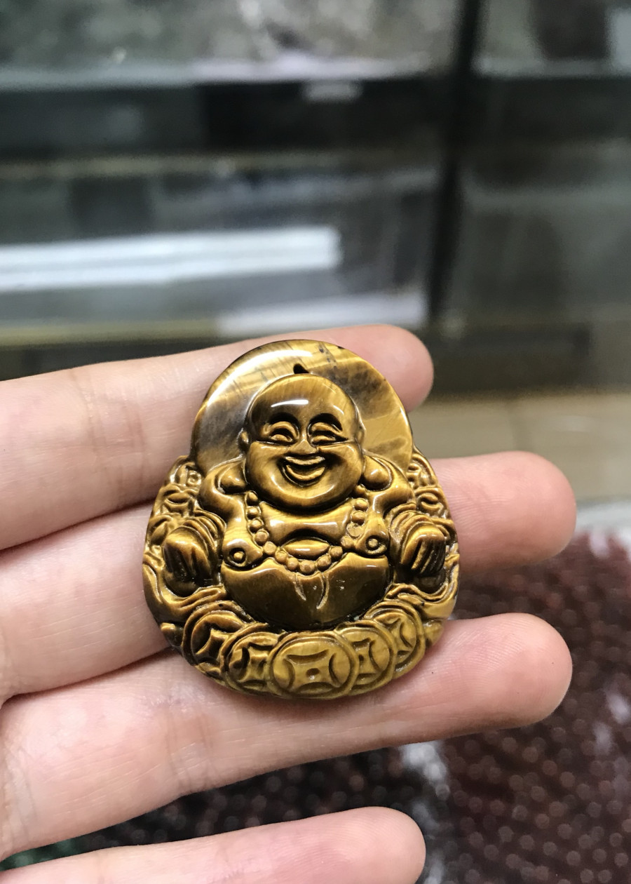 Phật Di Lặc mắt hổ nâu