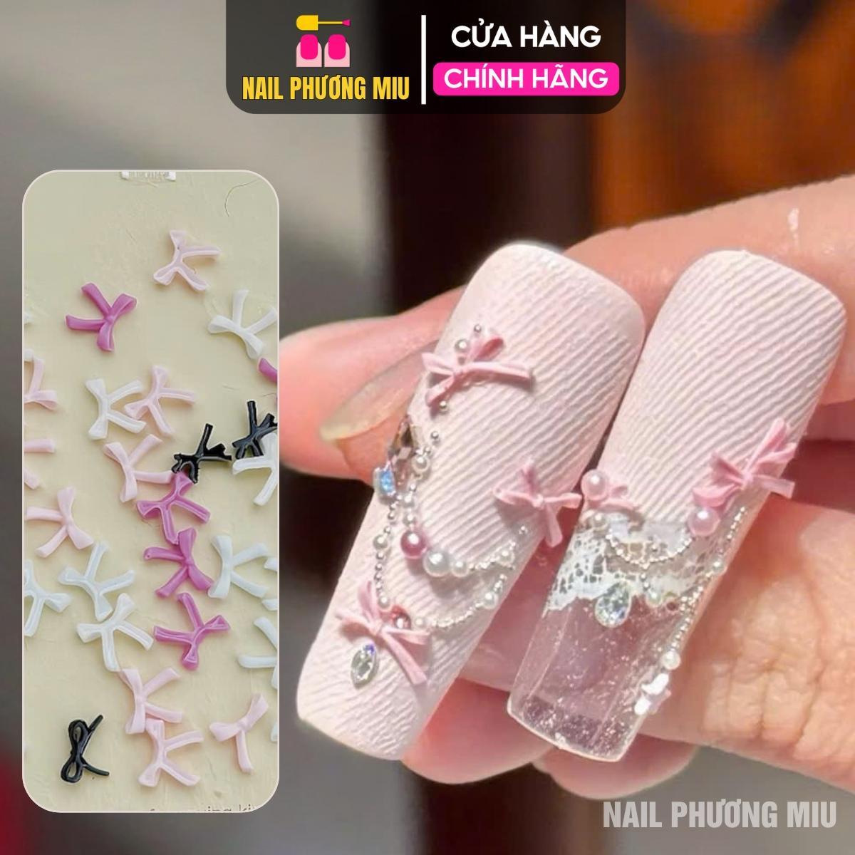 Set 50 Chiếc Charm Nơ Nhựa Nổi 3D SJY Mẫu Mới Làm Nail Siêu Xinh, Nơ Nút Thắt Ruy Băng Mix Màu Trắng Hồng Đen Size Mini Trang Trí Móng Hàn Quốc