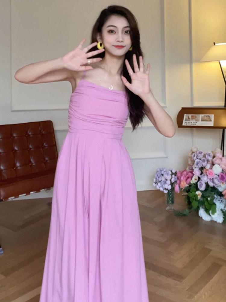 CHENGRUI Tea Break French Sling Dress 2023 Mùa hè bờ biển nghỉ mát thắt lưng có vẻ gầy màu vàng một chữ đầm dài