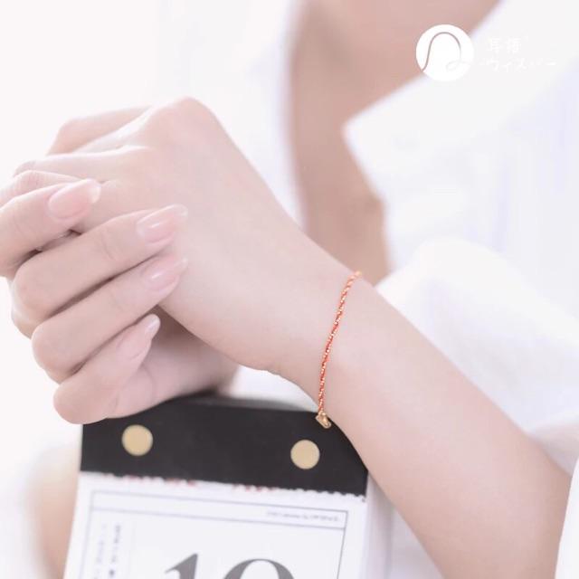 Vòng tay titan dây đỏ xoắn trơn