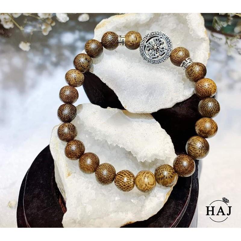 VÒNG TAY TRẦM HƯƠNG 8LI CHARM BÁNH XE PHÁP LUÂN BẠC
