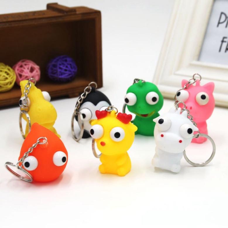 MÓC KHÓA BÓP LÒI MẮT-Móc Khóa Hoạt Hình Bóp Lòi Con Mắt Ra