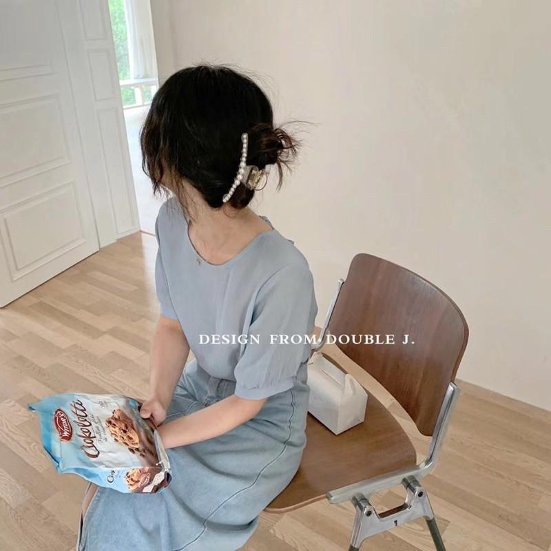 Sơ mi thắt nơ sau lưng chất trượt nhẹ