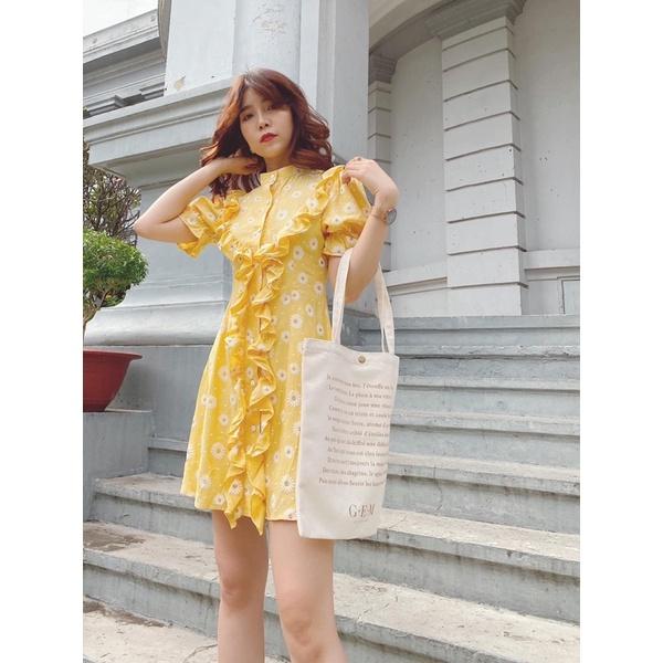 Đầm hoa vàng cổ trụ