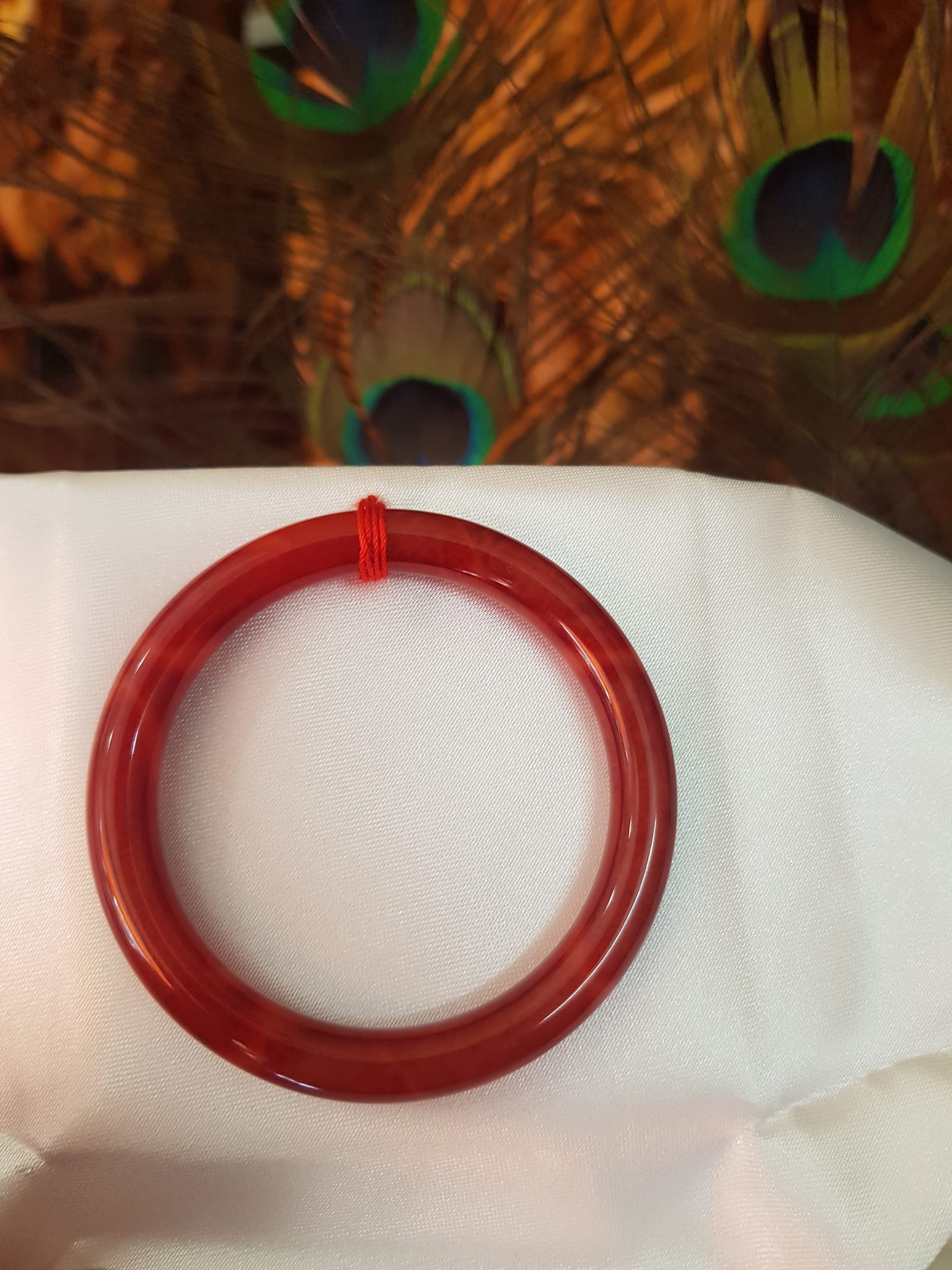 Vòng Nữ đá cẩm thạch Đỏ Đẹp 50mm x cọng 7,2mn Màu đỏ đậm vân vân đậm nhạt đều đẹp Nữ mệnh Hỏa Thổ 49kg - 54kg ạ