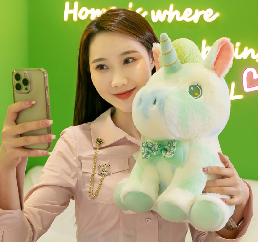 Gấu bông Màu loang Unicorn mắt trái tim đính nơ voan hoa 28cm siêu xinh