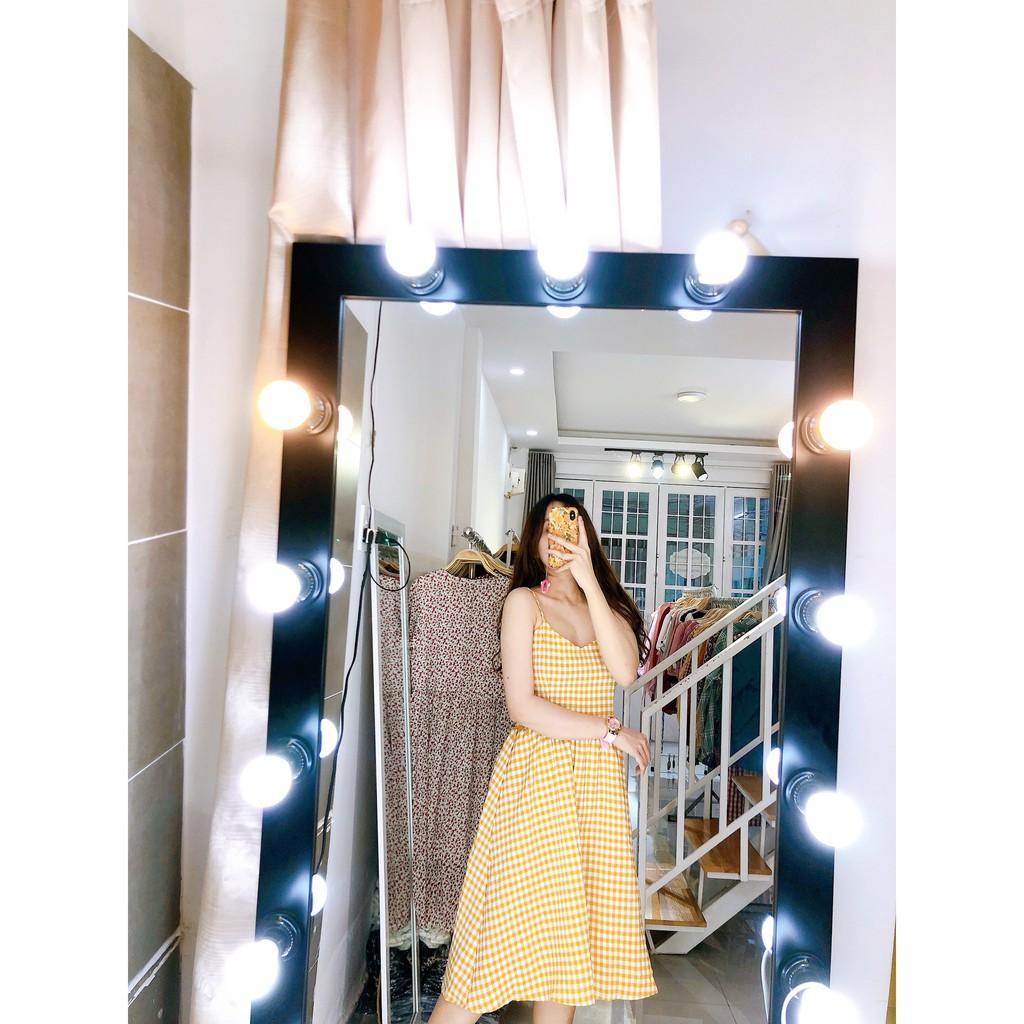Đầm caro hai dây xòe