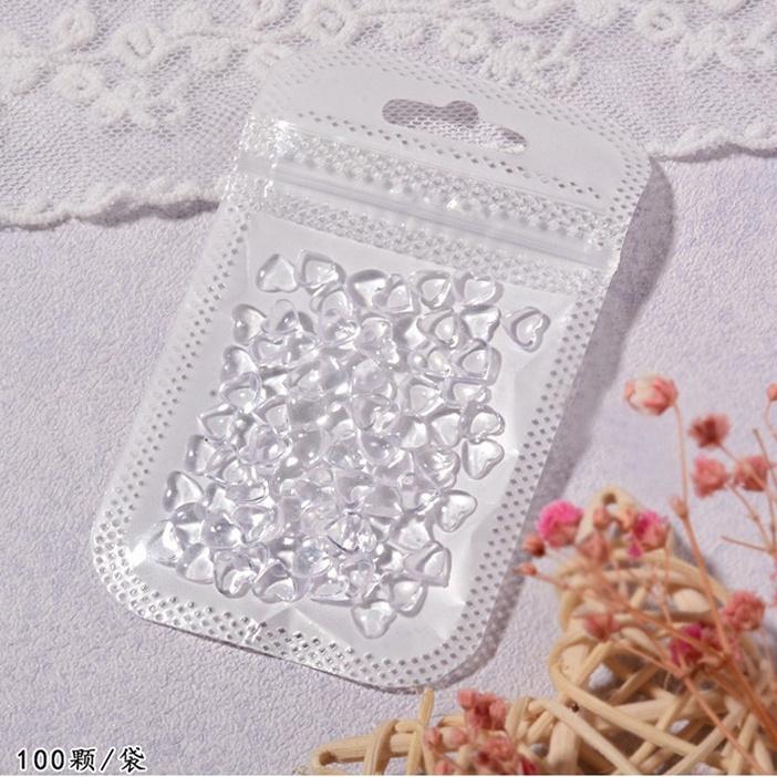 Set 100 Trái Tim Quả ĐàoTrong Suốt Pha Lê Đính Móng