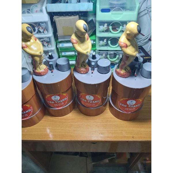 Bình đựng rót rượuu chú tiểu