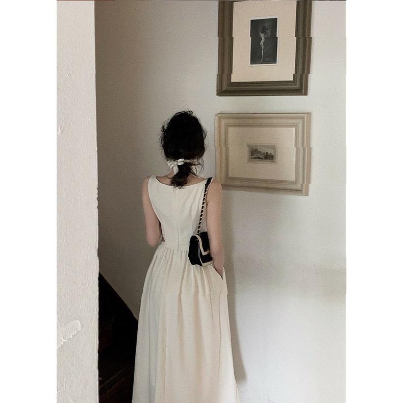 Váy đầm tiểu thư đen trắng khoét eo không tay dài qua gối kiểu Pháp