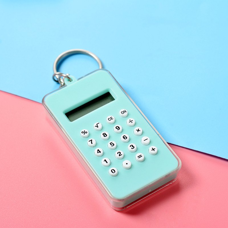 Móc Khoá Máy Tính Mini Mặt Sau Có Đồ Chơi Lăn Bi Vui Nhộn Màu Sắc Dễ Thương