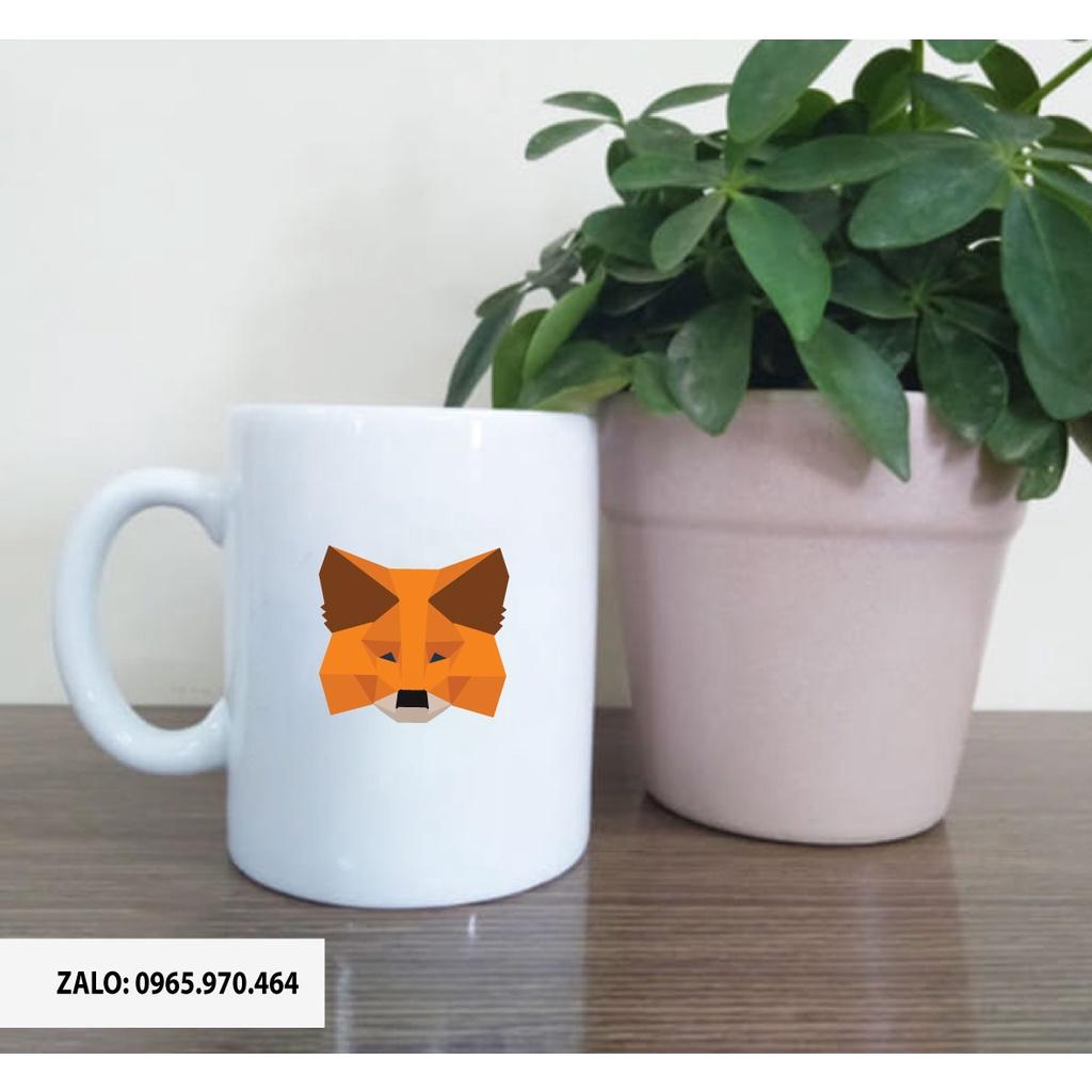 Ly Sứ Có Quai Họa Tiết LOGO VÍ METAMASK - In hình lên ly sứ, cốc theo yêu cầu của bạn - IN HÌNH LÊN LY LỚP, CÔNG TY