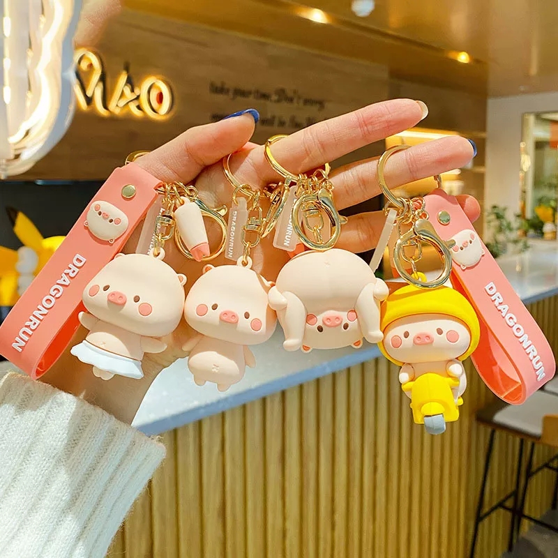 Móc khóa hình con Heo đi xe siêu cute để treo móc khóa oto, xe máy, túi xách, cặp sách, balo bền, đẹp, giá hợp lý