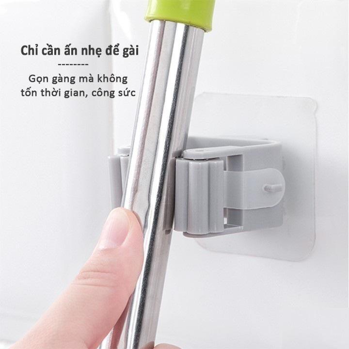 Móc kẹp chổi kẹp cây lau nhà dán tường cao cấp có cây lăn kép độc đáo chịu lực lên đến 6kg.