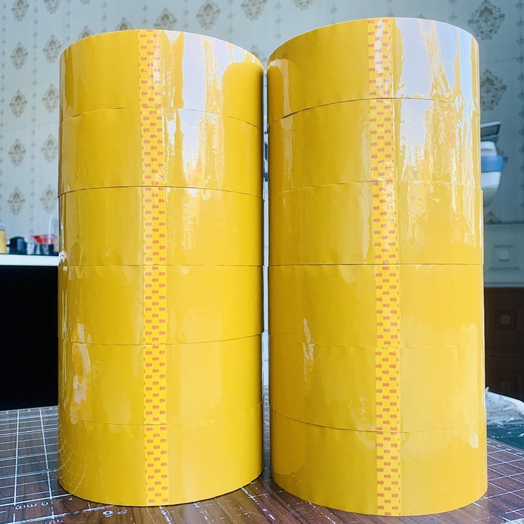 Băng keo đục cuộn 1kg loãi giấy 5li mỏng nhẹ