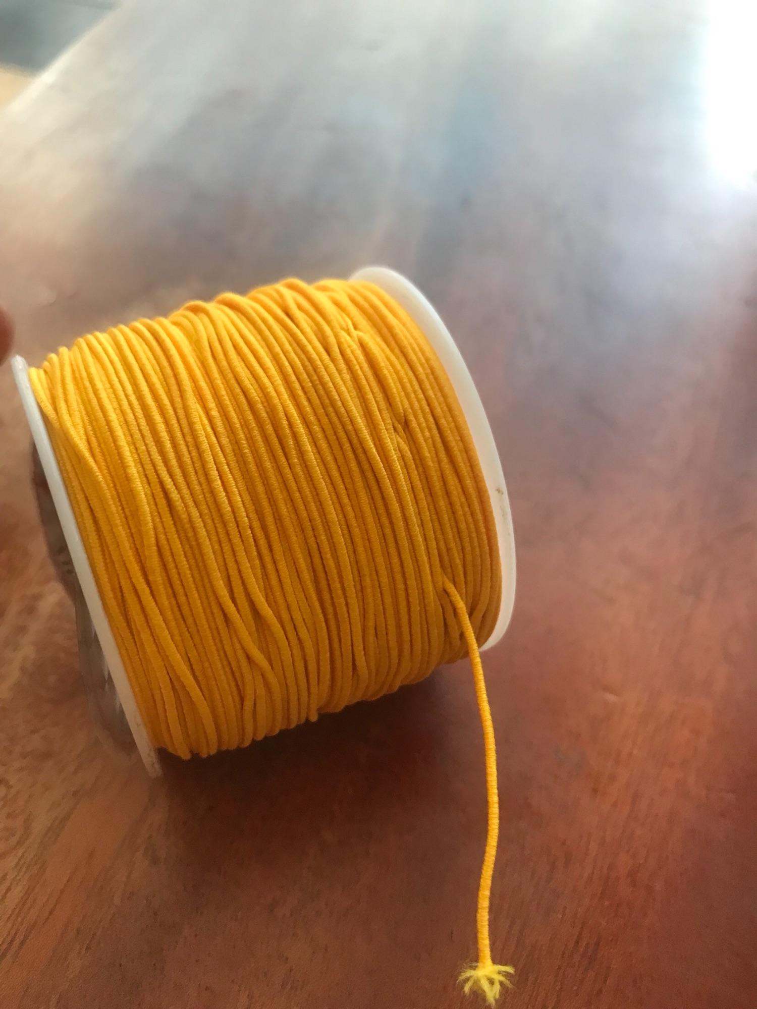 CUỘN DÂY THUN CO GIÃN ĐỘ DẦY CUỘN THUN 1MM MÀU VÀNG VÀNG TƯƠI XỎ VÒNG TAY GỖ NAM