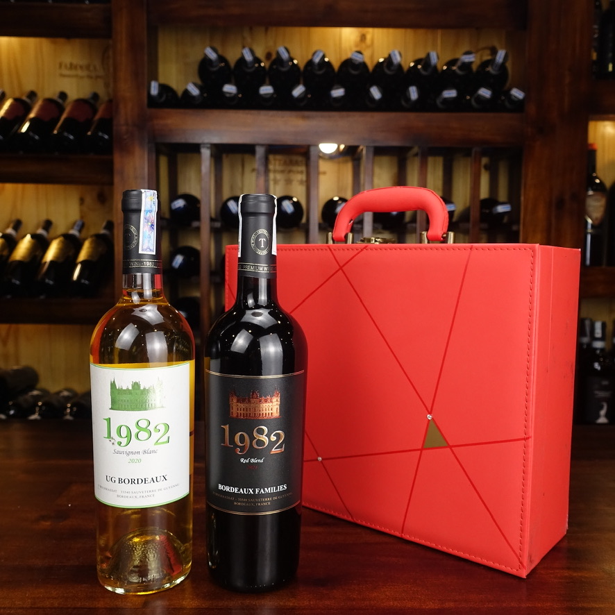 Hộp Vali đỏ đính đá + 2 chai rượu vang Pháp 1982 UG Bordeaux