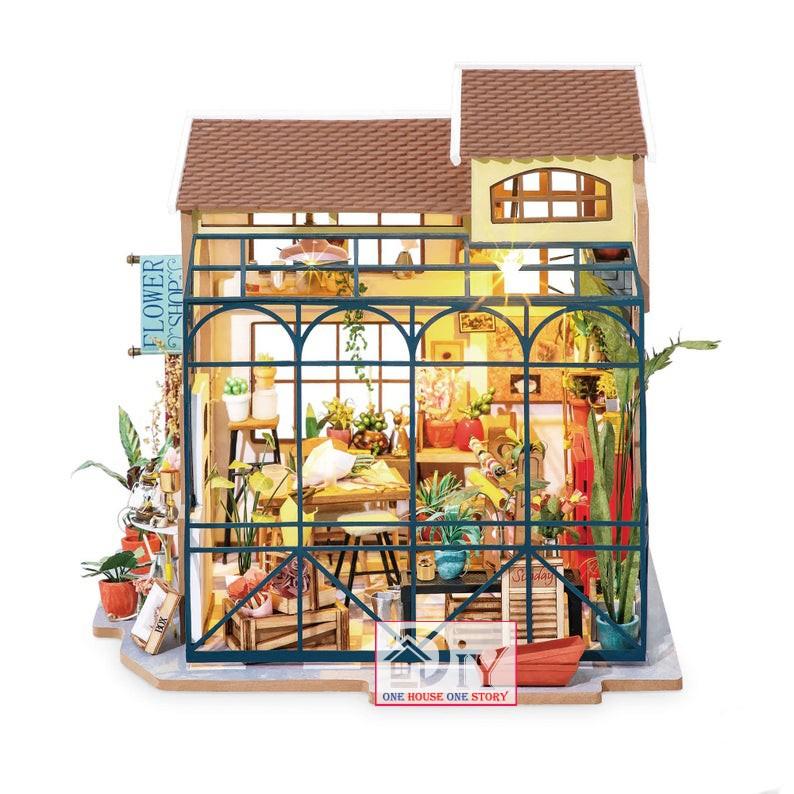 Mô hình nhà tự lắp ráp bằng gỗ Dollhouse EMILY'S FLOWER SHOP -  mã DG145 (Kèm nhíp + keo)