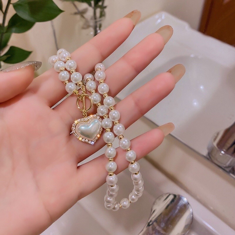 Vòng Cổ Choker Đính Hạt Ngọc Mặt Hình Trái Tim Thời Trang Sang Chảnh
