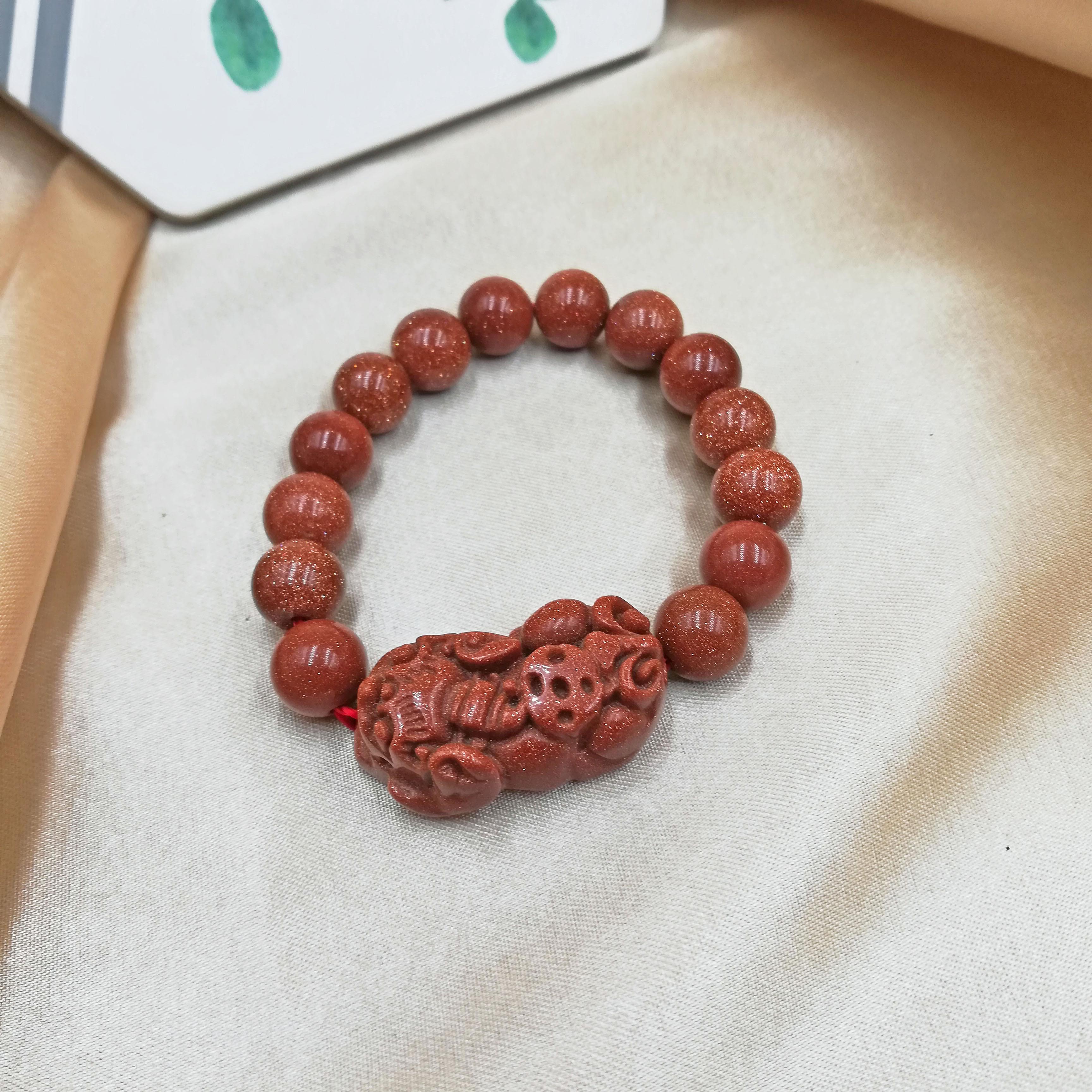 VÒNG TAY TỲ HƯU KIM SA PHỐI KIM SA ĐỎ 10 MM