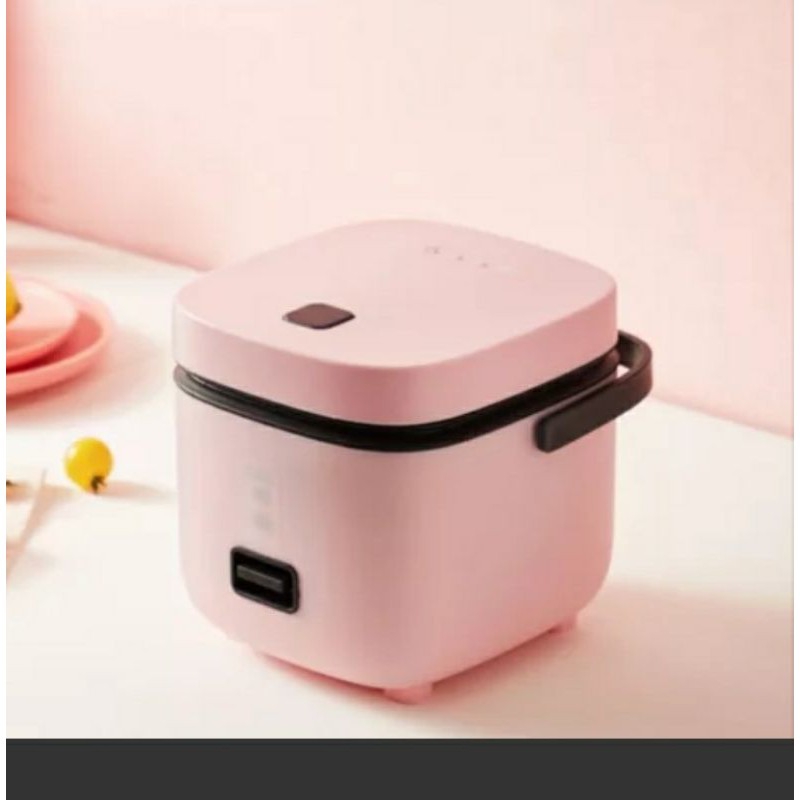 Nồi cơm mini 1.2l dùng cho 1,2 người , sinh viên, học sinh, độc thân có ổ cắm đa năng đi kèm D777