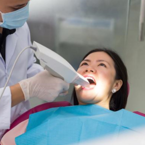 Hình ảnh Voucher chăm sóc sức khỏe răng miệng toàn diện bao gồm kiểm tra, chụp film 3D và trám 3 răng tại Nha Khoa Cẩm Tú