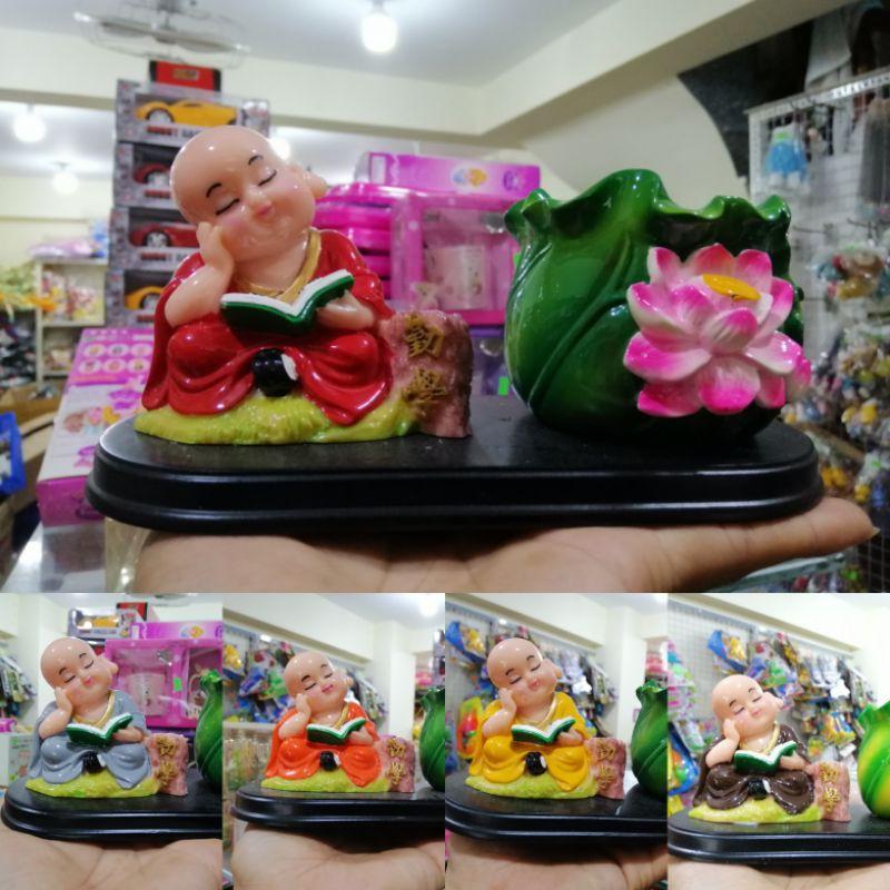 TƯỢNG CHÚ TIỂU ĐỌC SÁCH BÊN CHẬU SEN