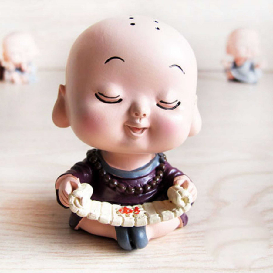 Tượng chibi chú tiểu học thư pháp