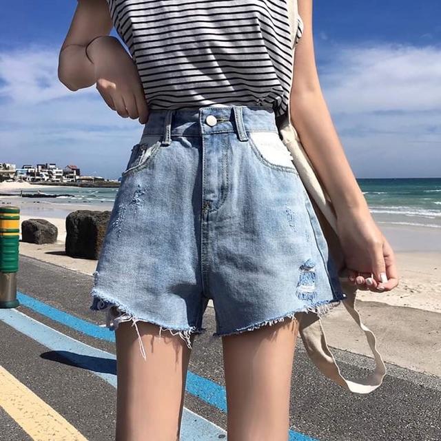 Quần shorts jean túi trắng