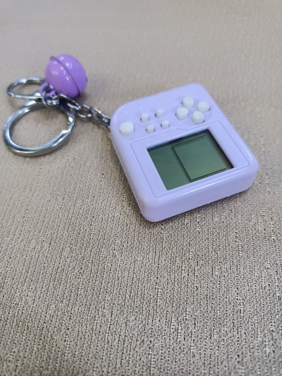 MÓC KHÓA MÁY CHƠI GAME TIỆN LỢI