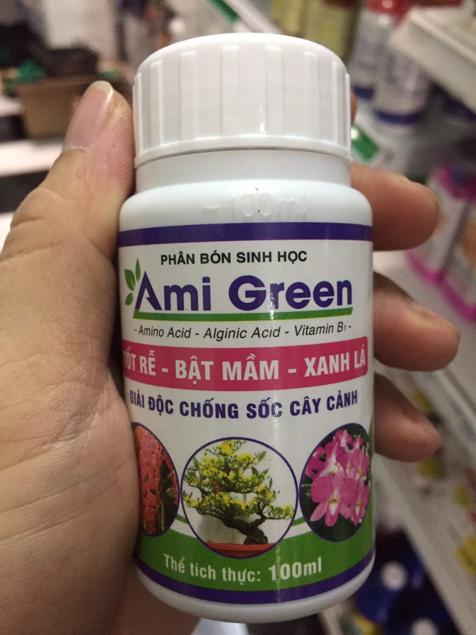 Phân bón sinh học AMIGREEN Kích rễ, kích mầm, giải độc cây - Chai 100ml - Ami Green Tốt rễ, bật mầm, xanh lá cây trồng