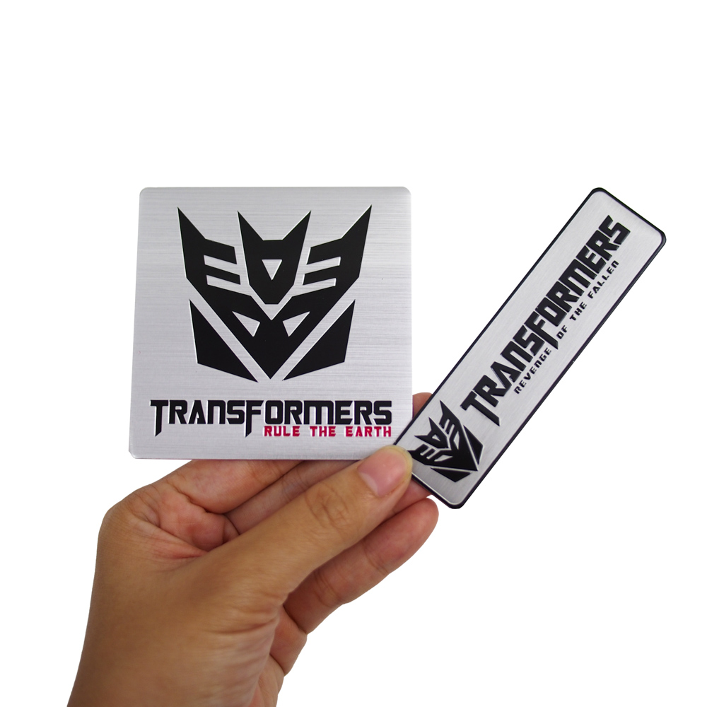 Set 2 sticker metal hình dán - Transformer Rule The Earth