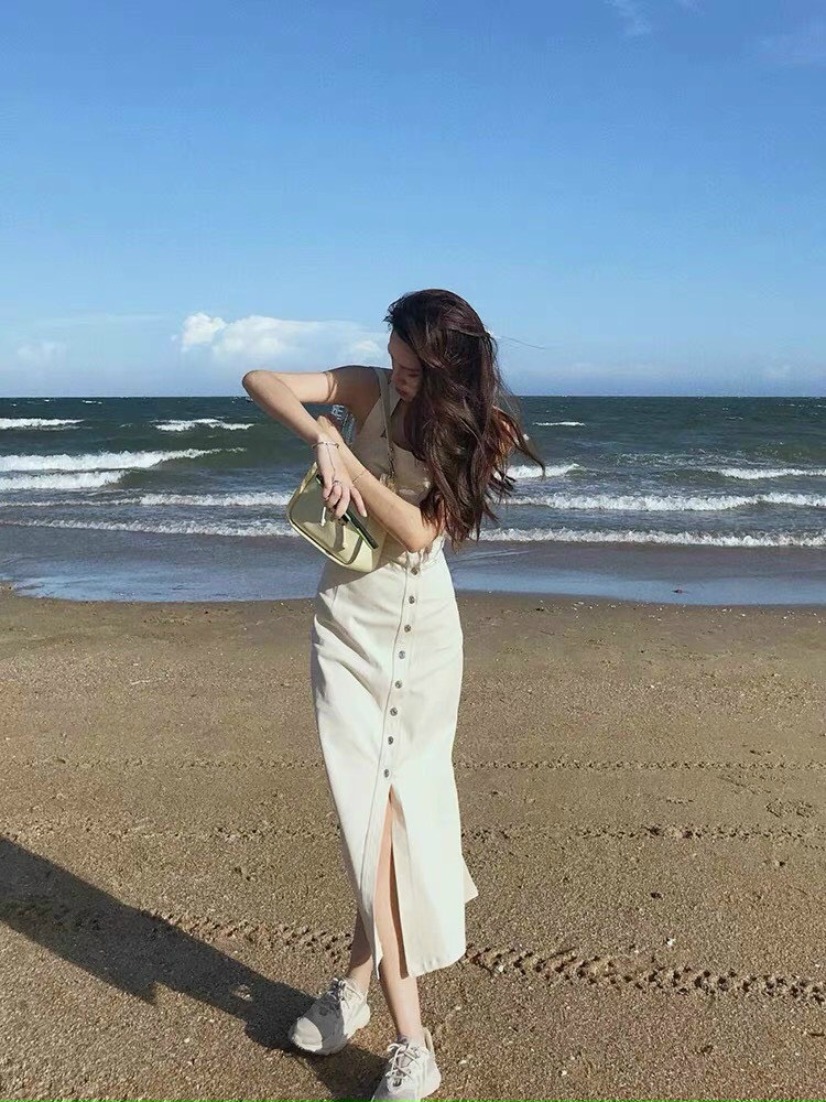 Đầm váy midi cut eo lưng xẻ tà