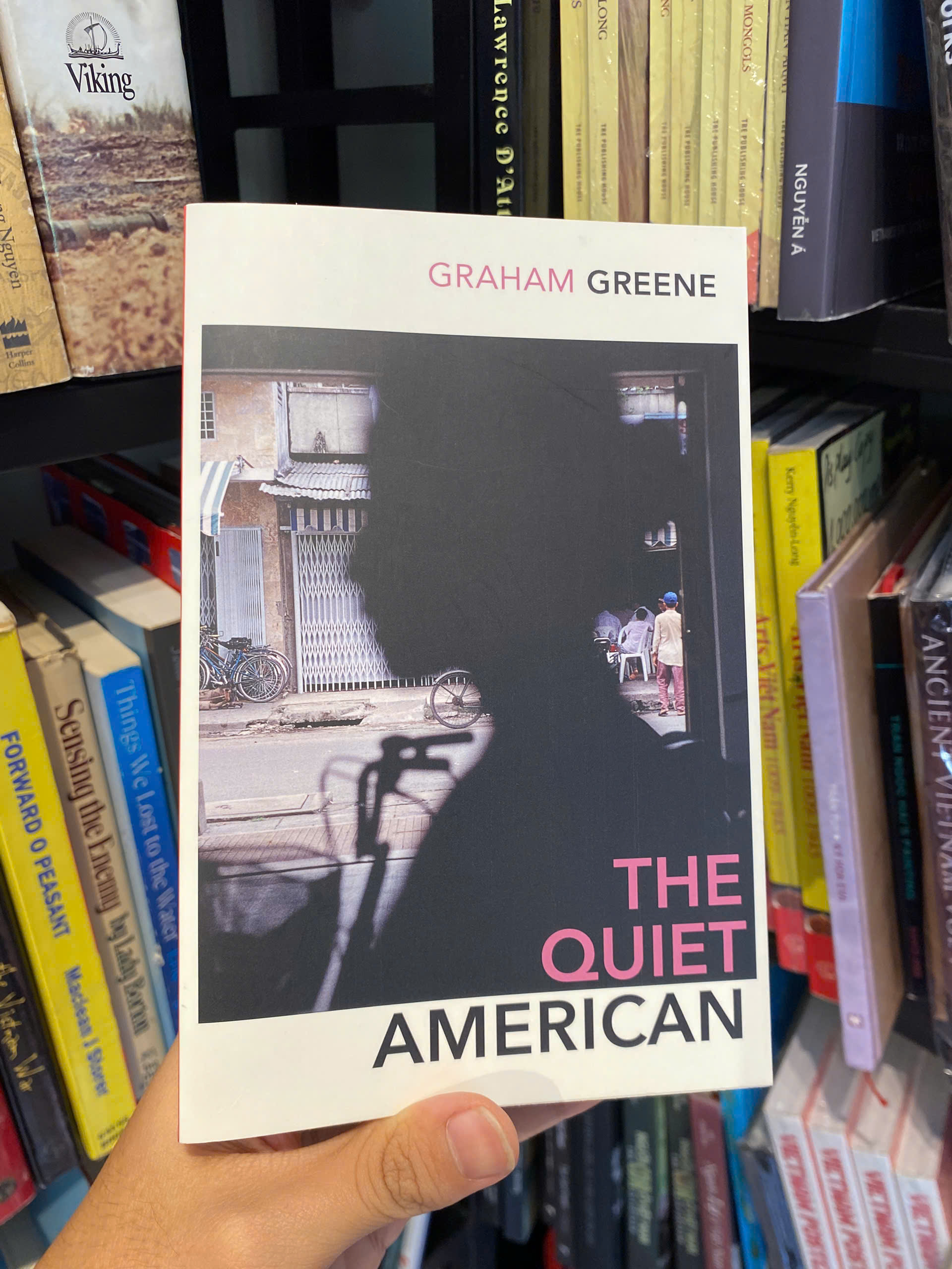 Sách - The Quiet American: Exploration of love, innocence, and morality in Vietnam by Graham Greene | Classics / Historical Fiction / War Literature