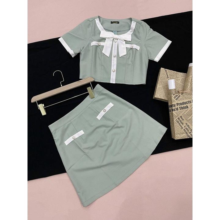 Set chân váy và áo croptop cổ thắt nơ tông màu pastel nữ tính