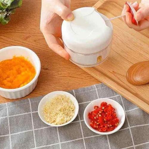 Dụng cụ xay tỏi ớt cầm tay