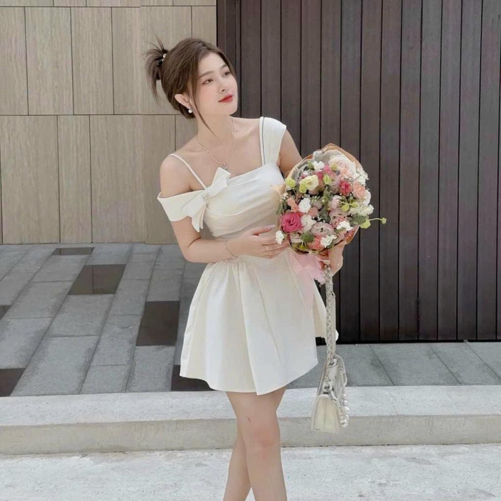 Đầm xòe lệch vai đính nơ