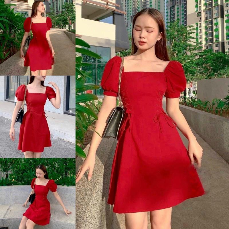 Đầm xoè cổ vuông tay phồng đan dây eo
