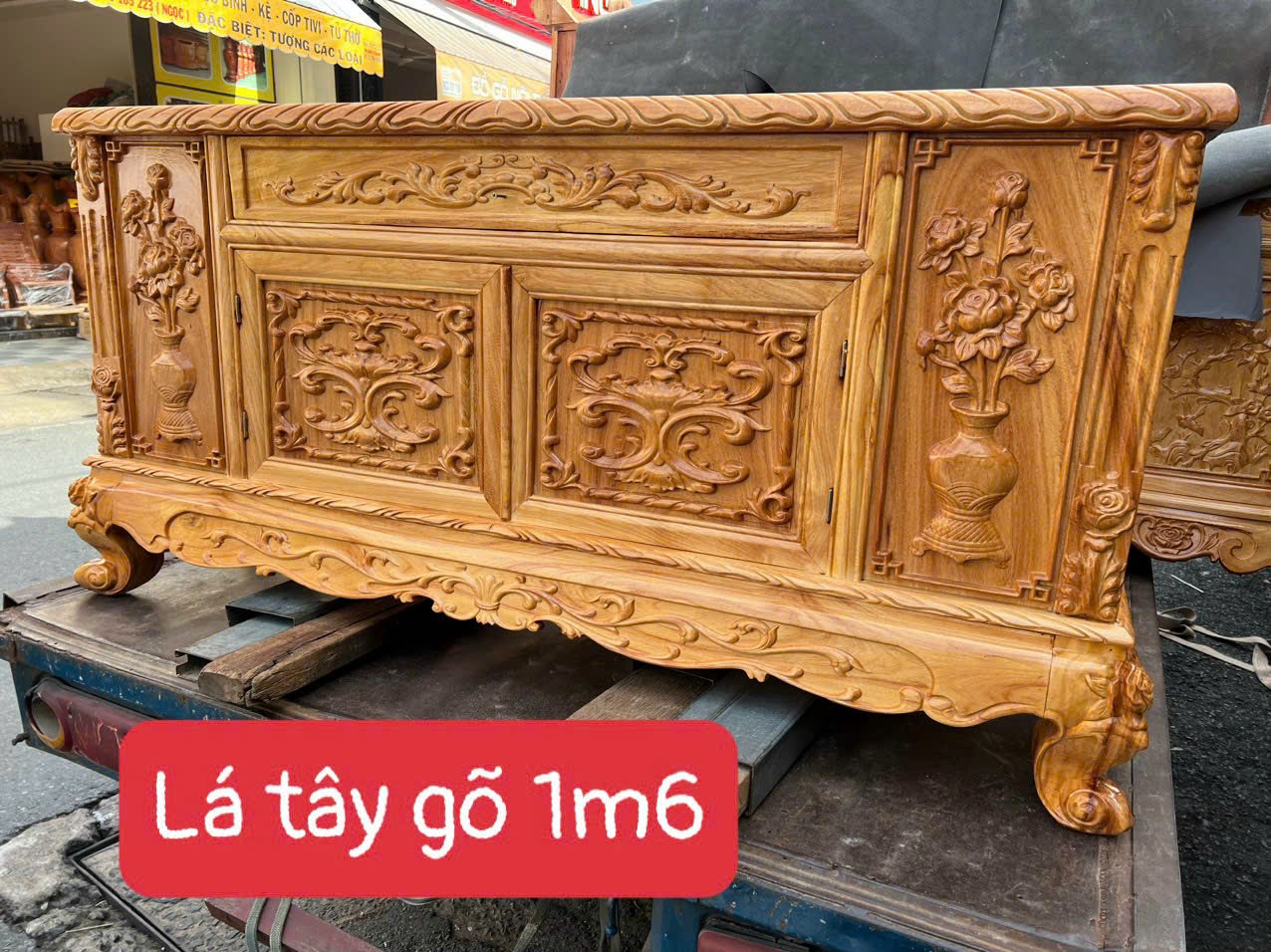 KỆ TIVI ĐỂ PHÒNG KHÁCH HOA LÁ TÂY GỖ GÕ MẪU BẰNG 1M6-1M8-2M-2M2