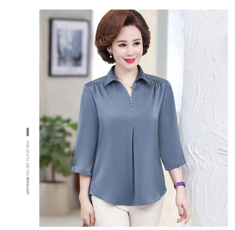 Áo sơ mi trung niên vai rúm mềm mại.